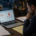 Business owner reviewing a frozen business bank account after a merchant cash advance bank levy