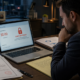 Business owner reviewing a frozen business bank account after a merchant cash advance bank levy